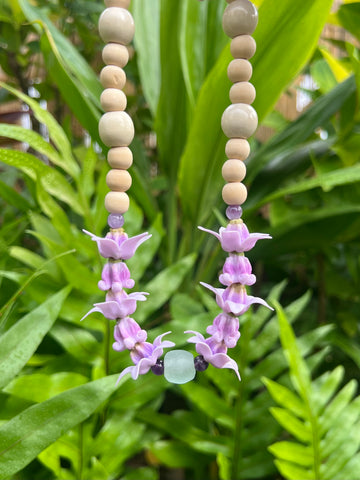 PO'AI - Light Pua Kalaunu